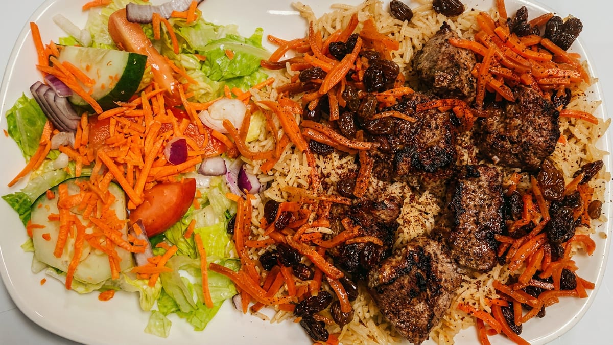 Afghan roots, Albany home